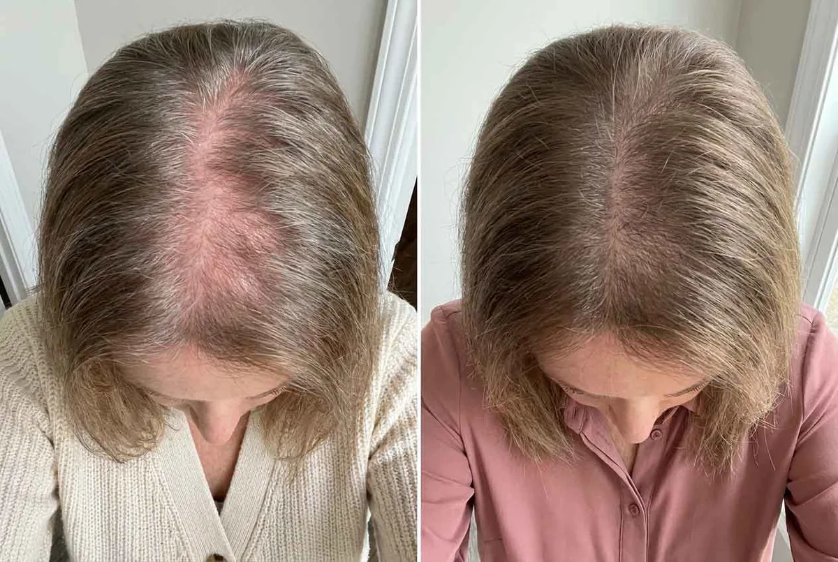 Woman over 50 examining her hair in bathroom mirror
