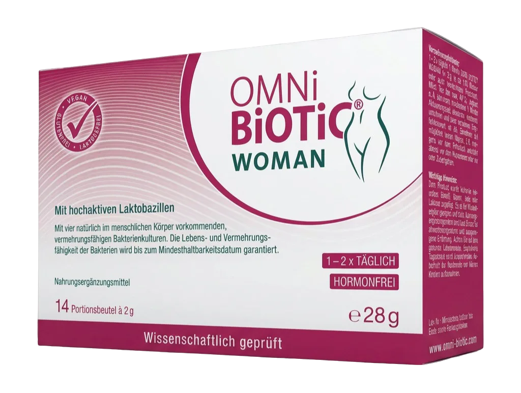 OMNi-BiOTiC WOMAN Sachets in typischer grün-weißer Verpackung aufgefächert dargestellt, einzelne Portionsbeutel sichtbar, professionelle Studioaufnahme mit neutralem Hintergrund, Pulverform des Produkts angedeutet