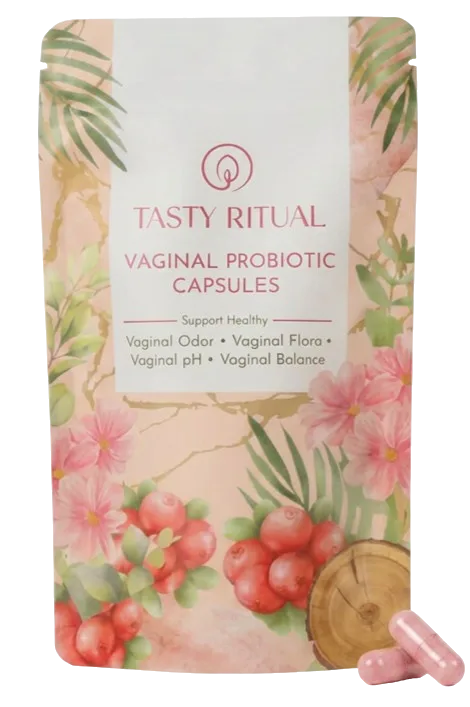 Vaginal Probiotics Kapseln in moderner weißer Dose mit minimalistischem Design, professionell ausgeleuchtet auf Marmor-Untergrund, einzelne Kapseln daneben arrangiert zeigen die kompakte Größe, hochwertige Produktfotografie mit sanften Schatten